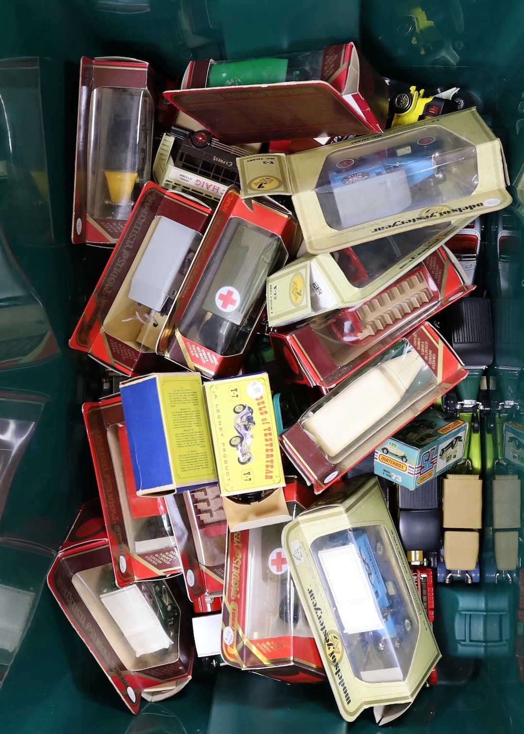 A collection of Matchbox and other die-cast toys